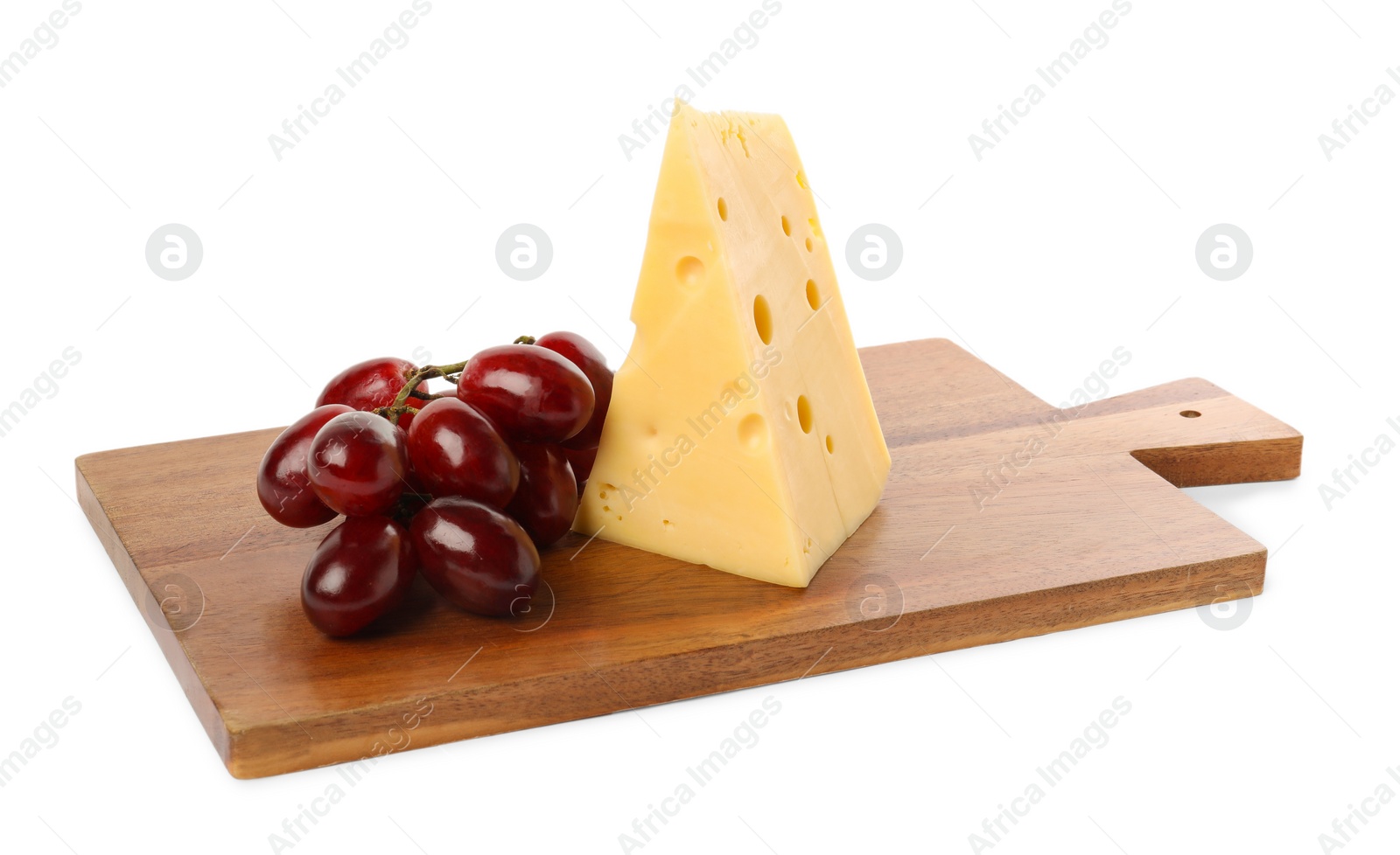 Photo of Piece of delicious cheese and grapes isolated on white