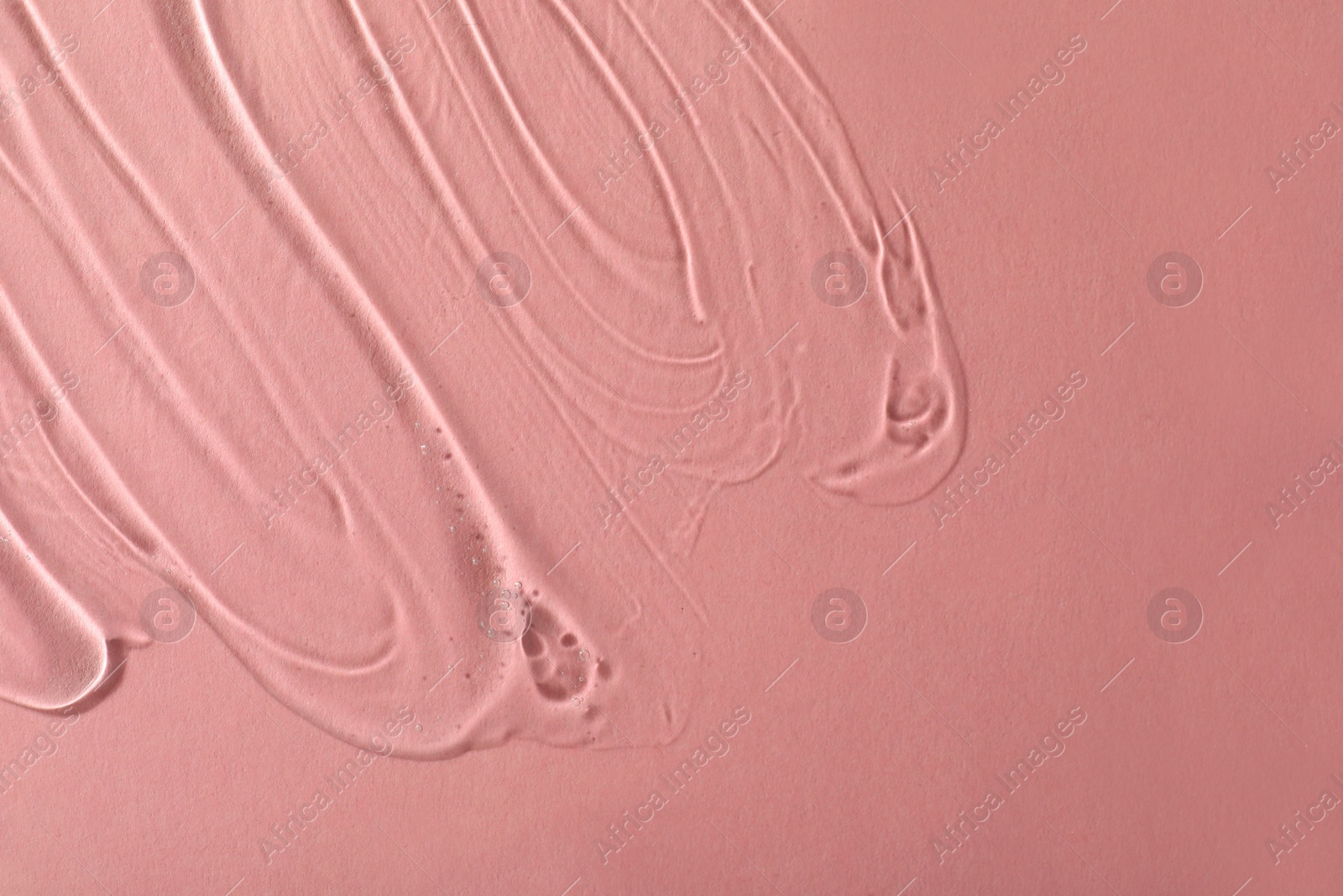 Photo of Cosmetic gel on pink background, top view. Space for text