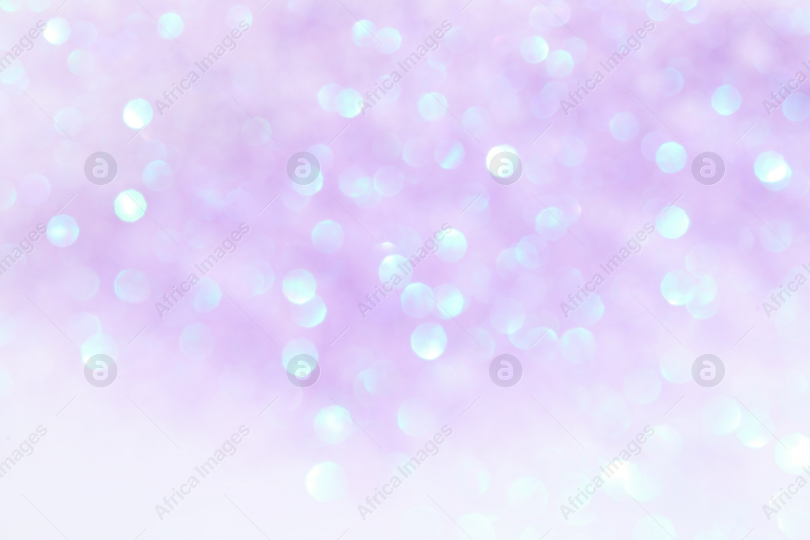 Photo of Shiny lilac background with magical bokeh effect