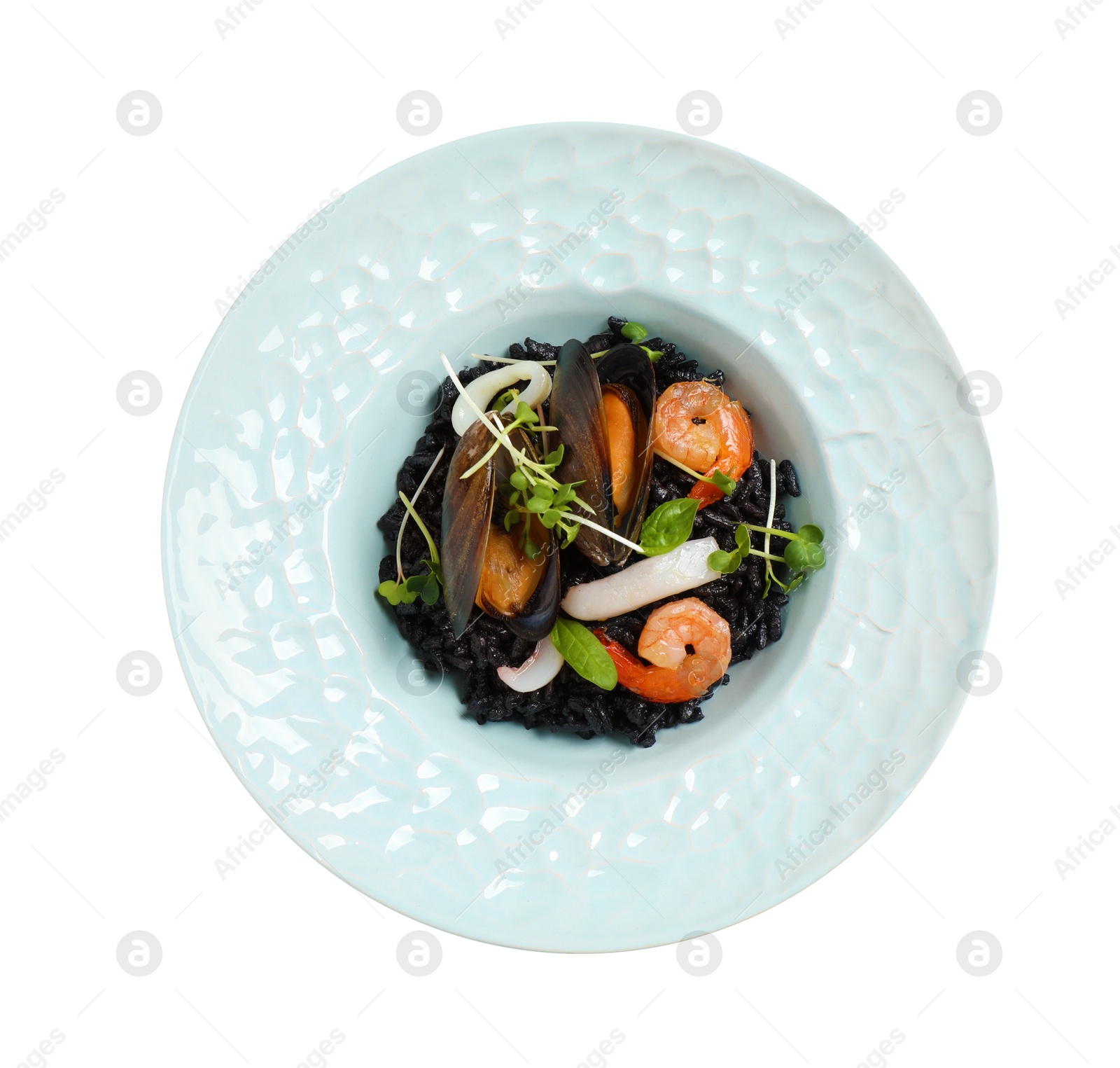Photo of Delicious black risotto with seafood isolated on white, top view