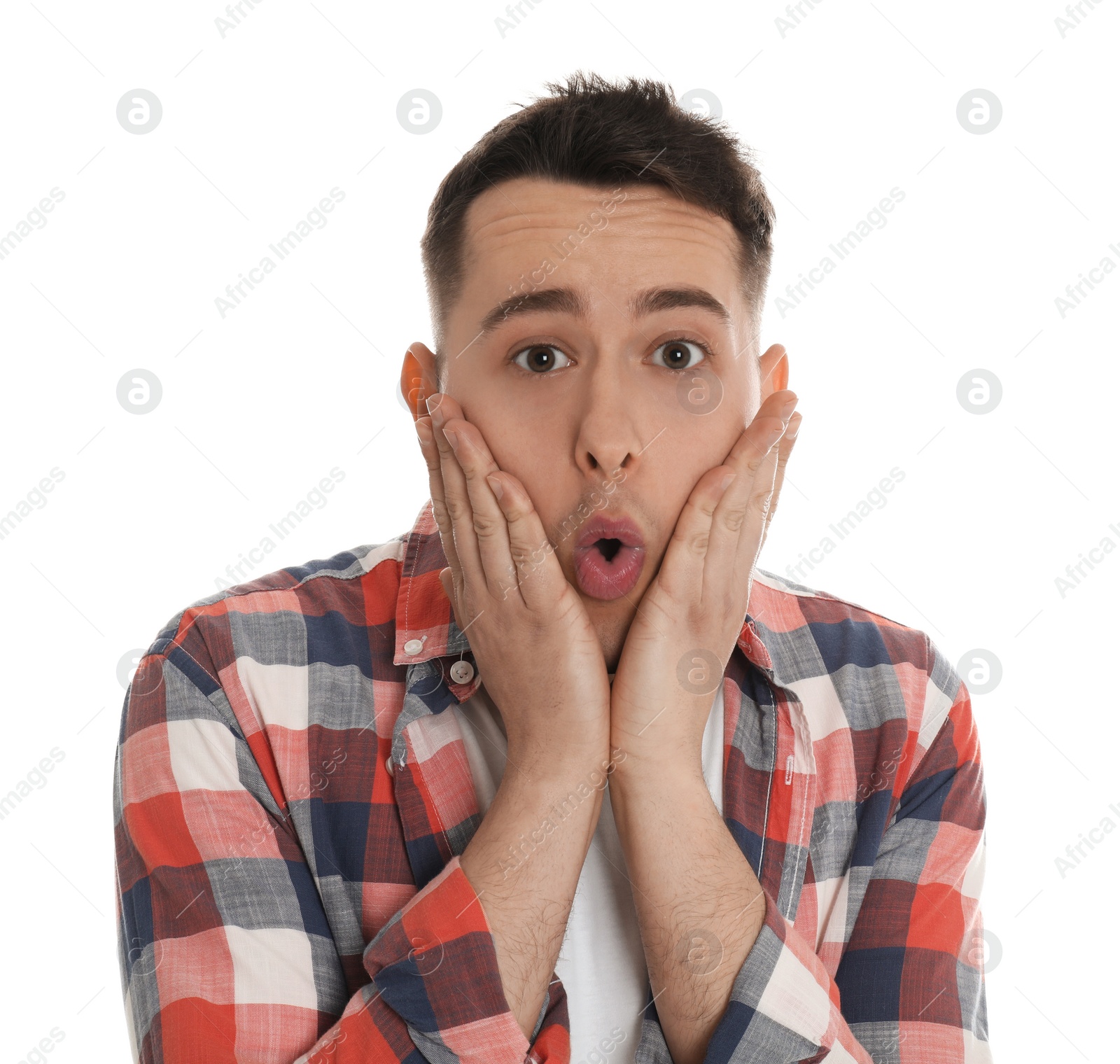 Photo of Portrait of surprised young man on white background