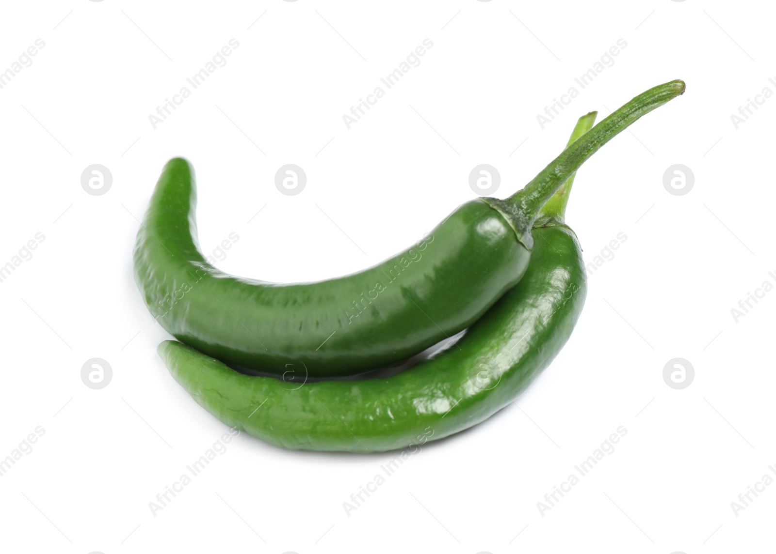 Photo of Green hot chili peppers on white background