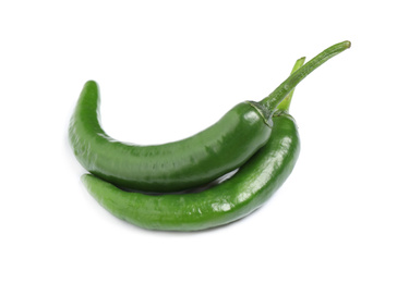 Green hot chili peppers on white background