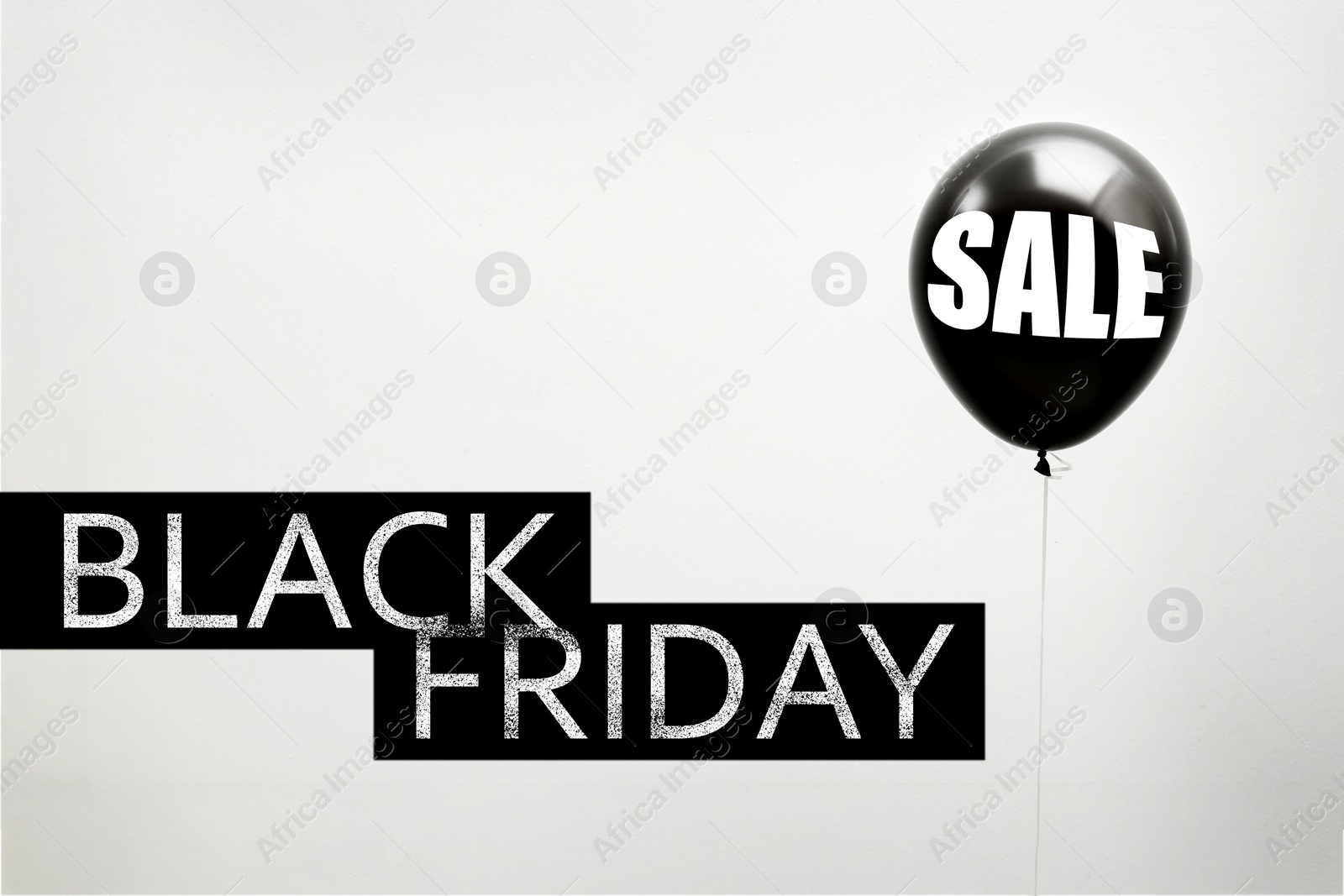 Image of Black Friday. Balloon with word SALE on light background 
