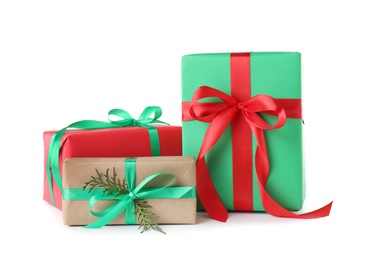 Different Christmas gift boxes on white background