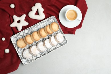 Photo of Flat lay composition with tasty cookies on light grey table, space for text