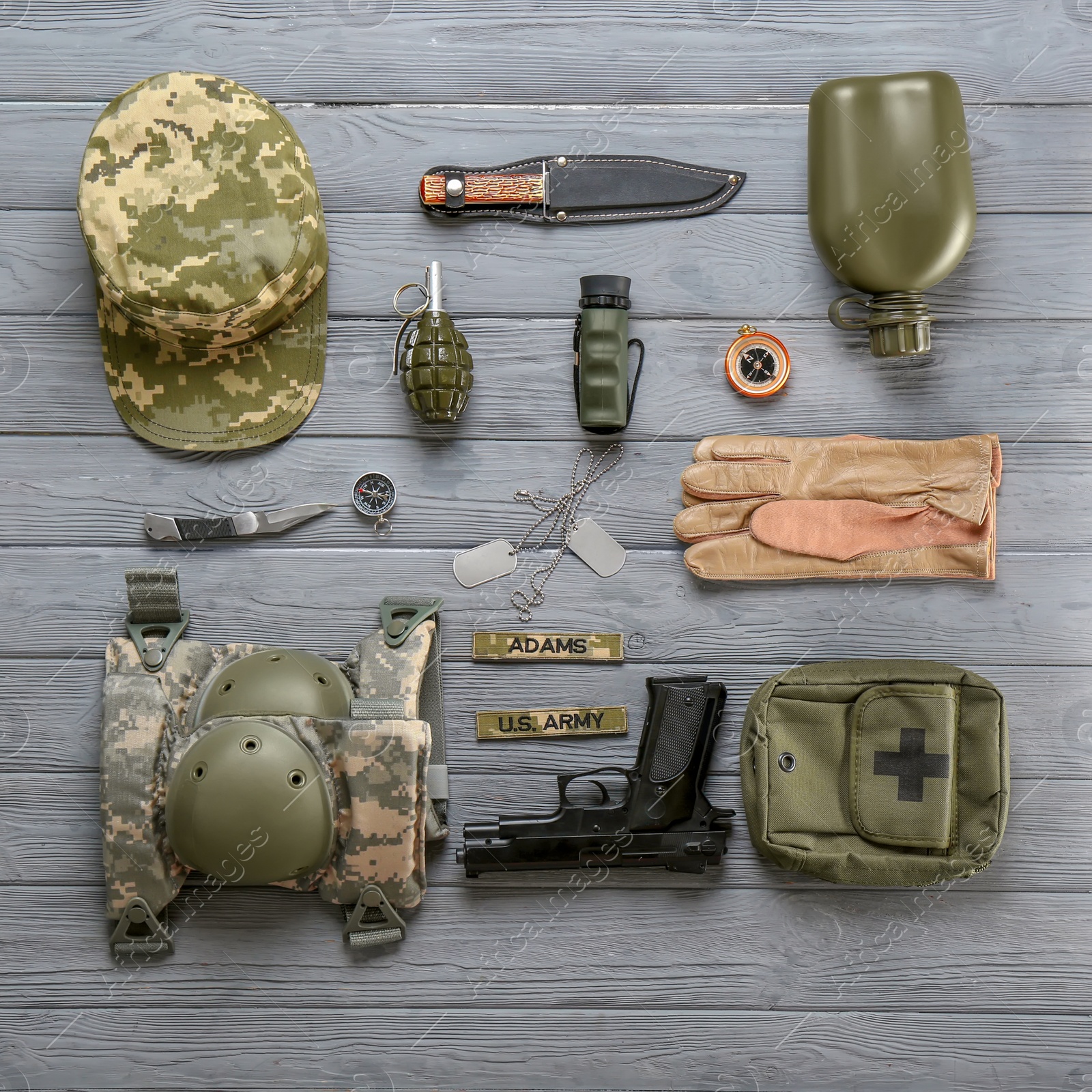 Photo of Set of military equipment on wooden background, flat lay