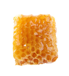 Photo of Piece of tasty fresh honeycomb isolated on white