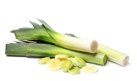 Photo of Fresh raw leeks on white background. Ripe onion