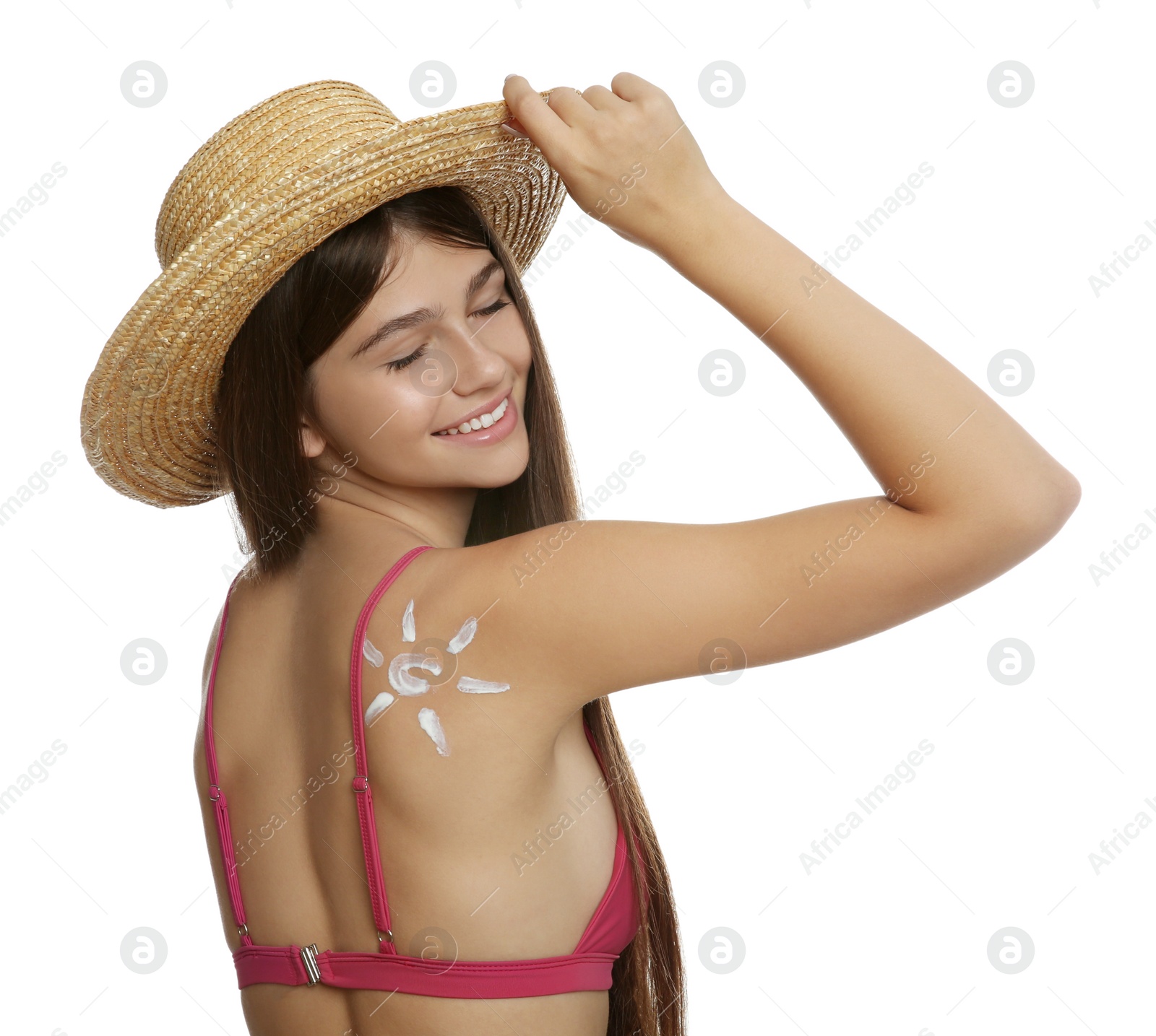 Photo of Teenage girl with sun protection cream on her back against white background