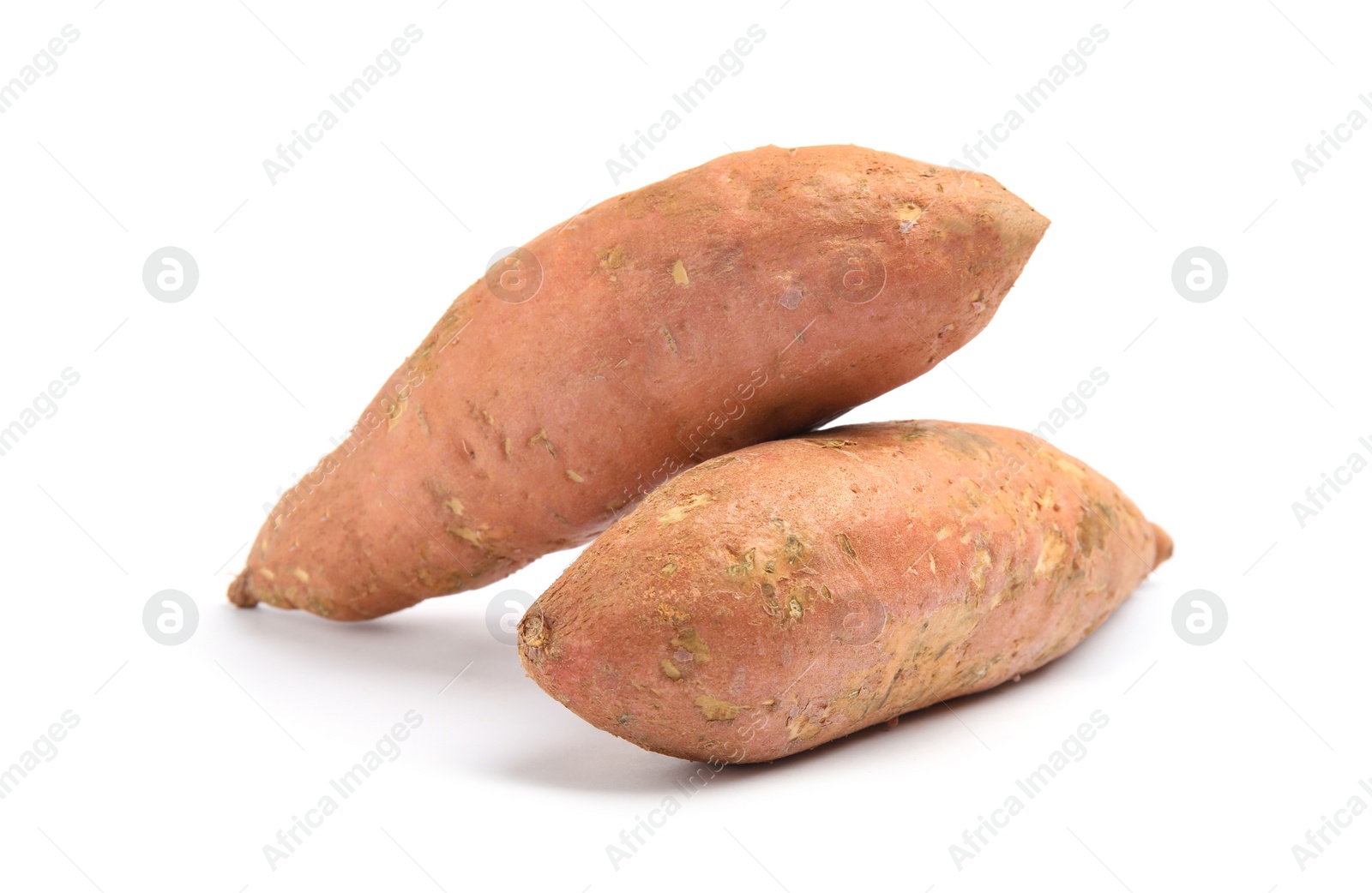 Photo of Whole ripe sweet potatoes on white background