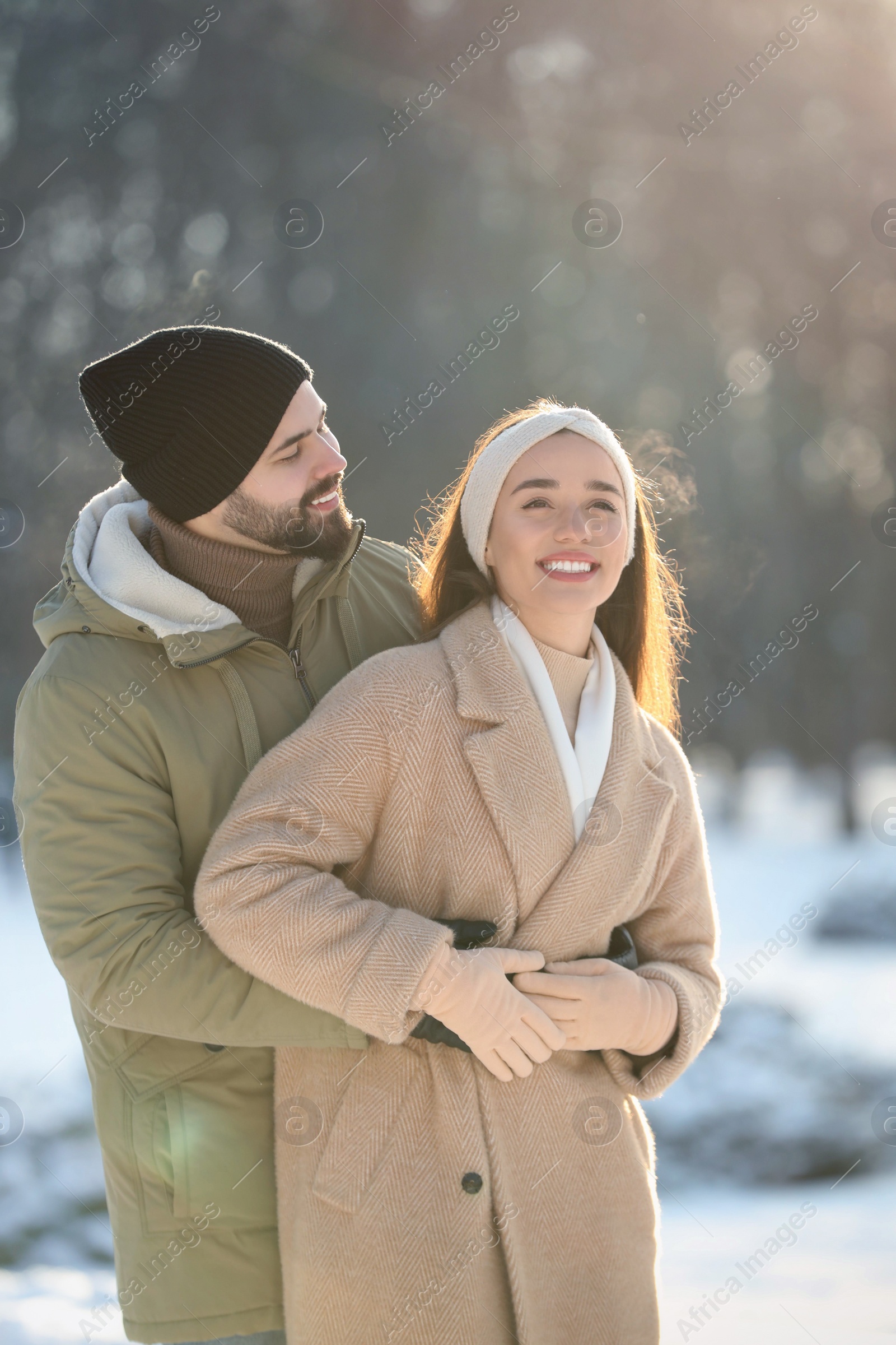 Photo of Beautiful young couple enjoying winter day outdoors