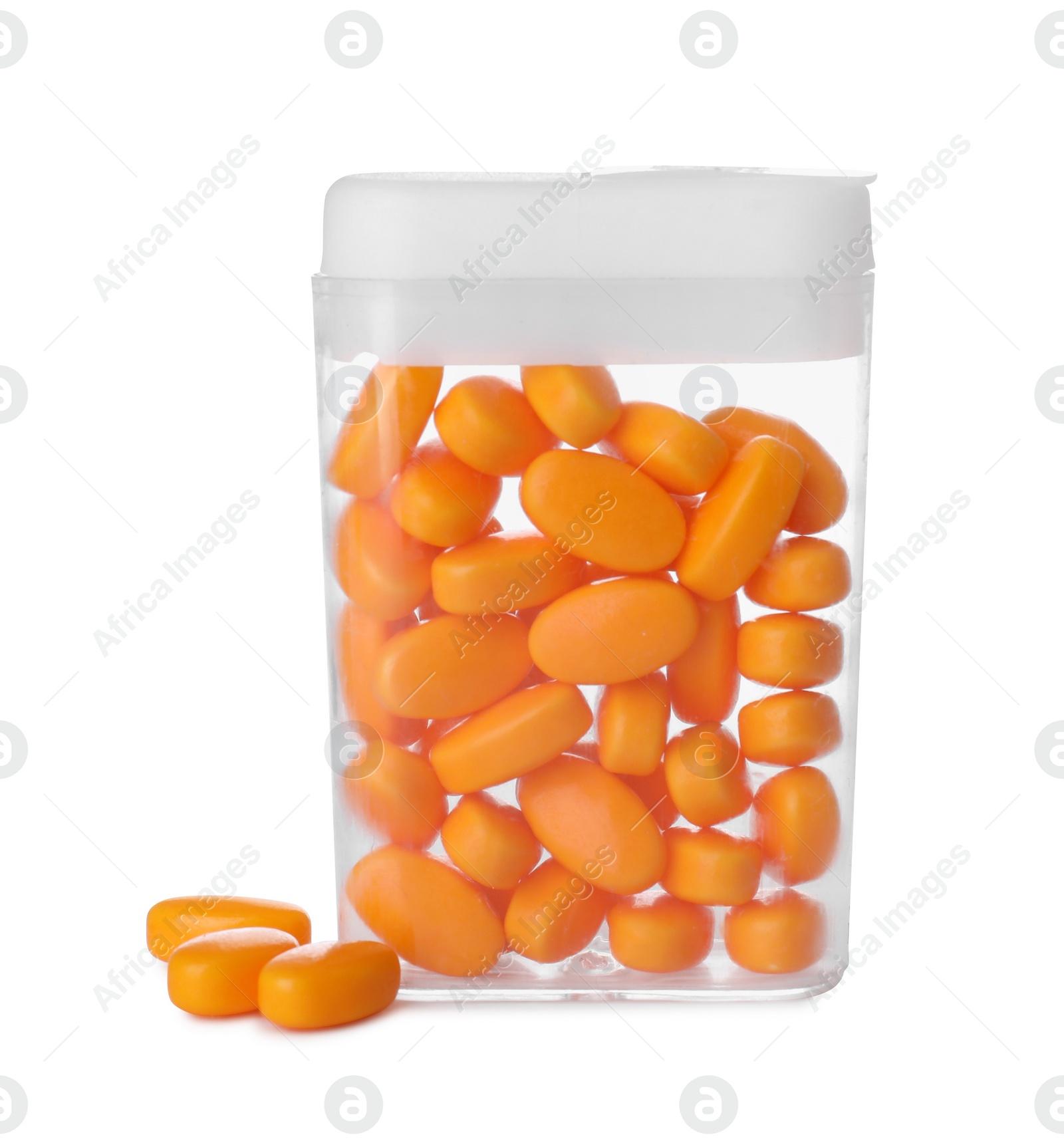 Photo of Tasty orange dragee candies in box on white background