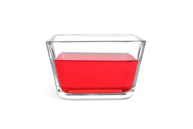 Tasty jelly dessert in glass bowl on white background