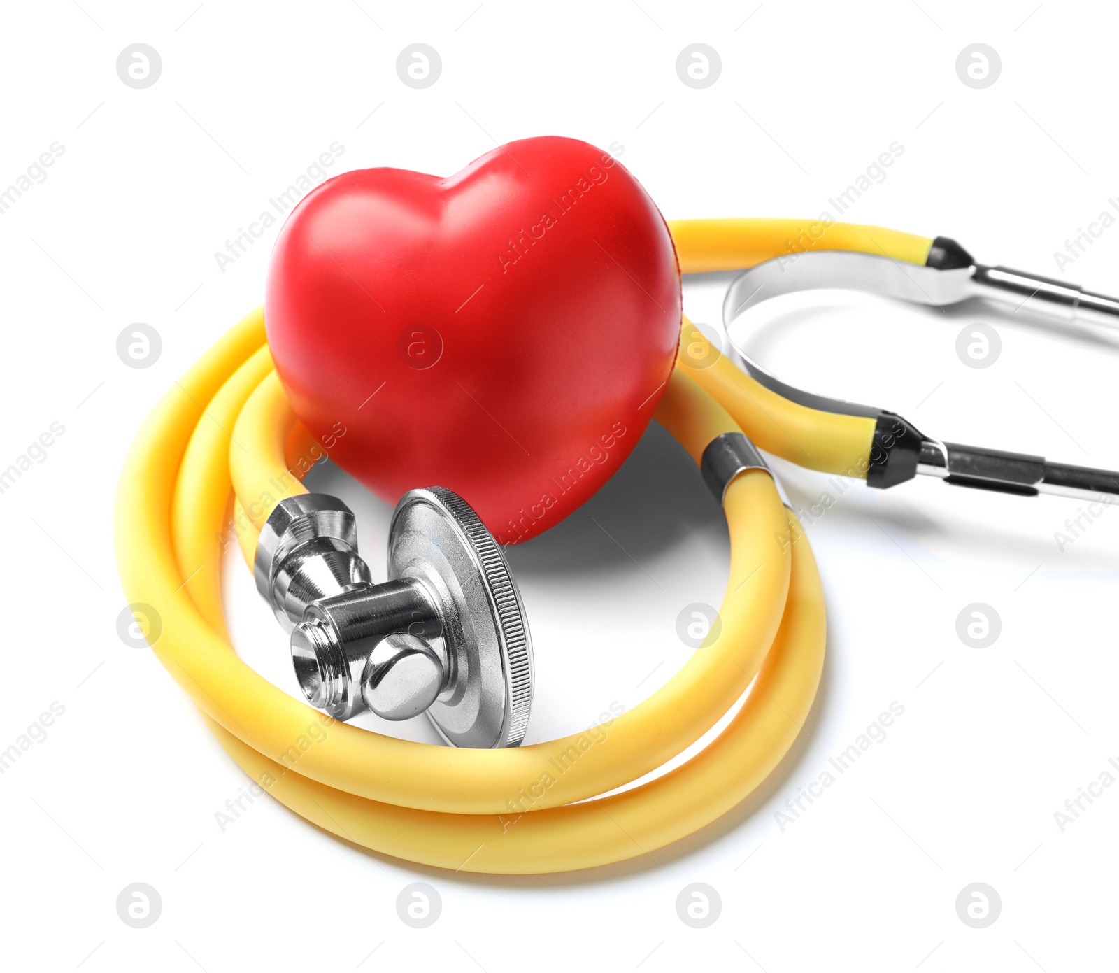 Photo of Stethoscope for checking pulse and red heart on white background