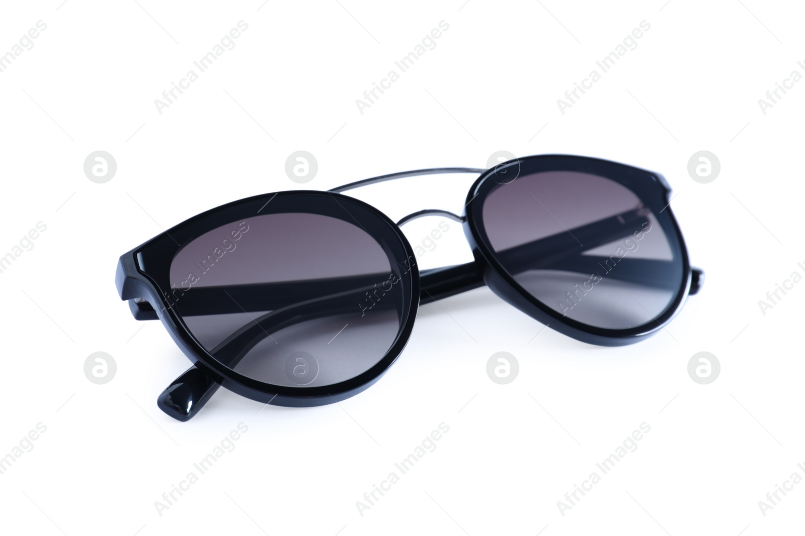 Photo of Stylish sunglasses on white background. Summer accessory