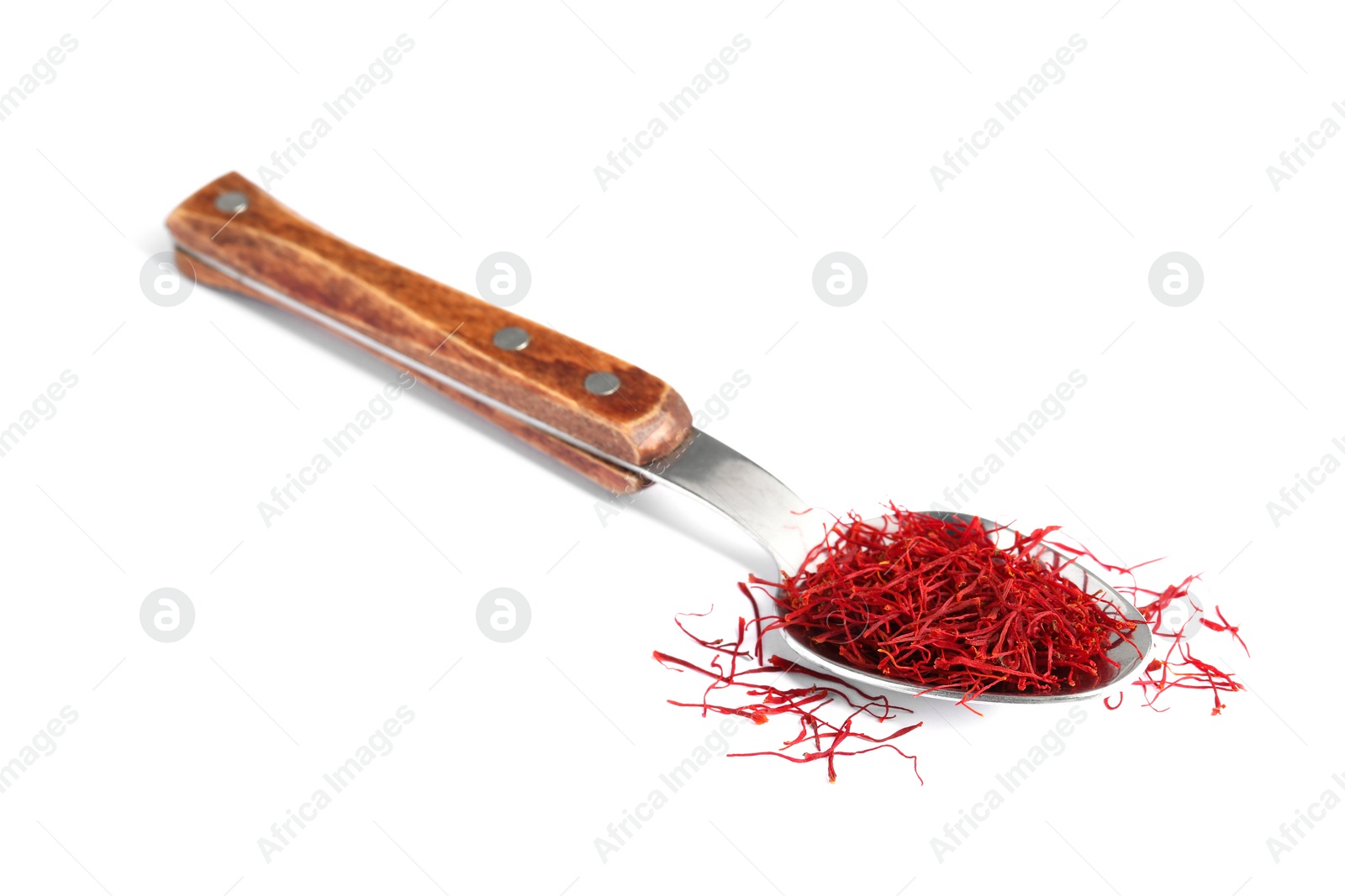 Photo of Aromatic saffron and spoon isolated on white