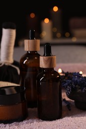 Photo of Composition with spa products and dry lavender flowers on soft light surface