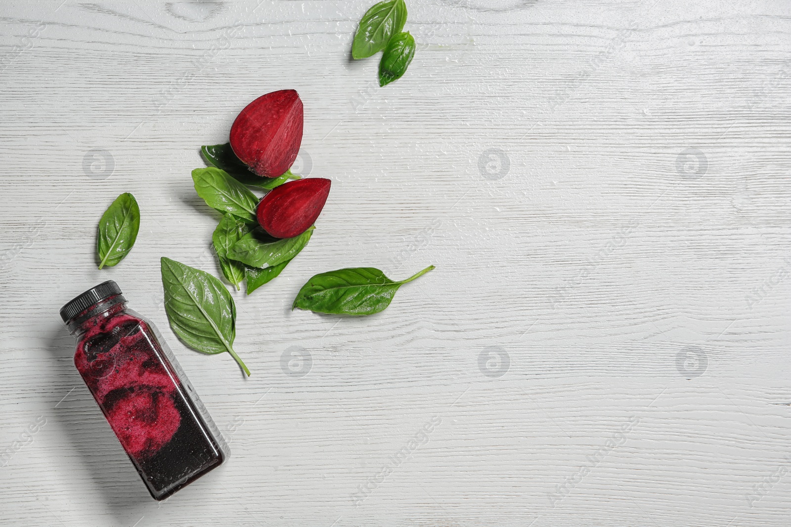 Photo of Flat lay composition with beet smoothie on white wooden background with space for text