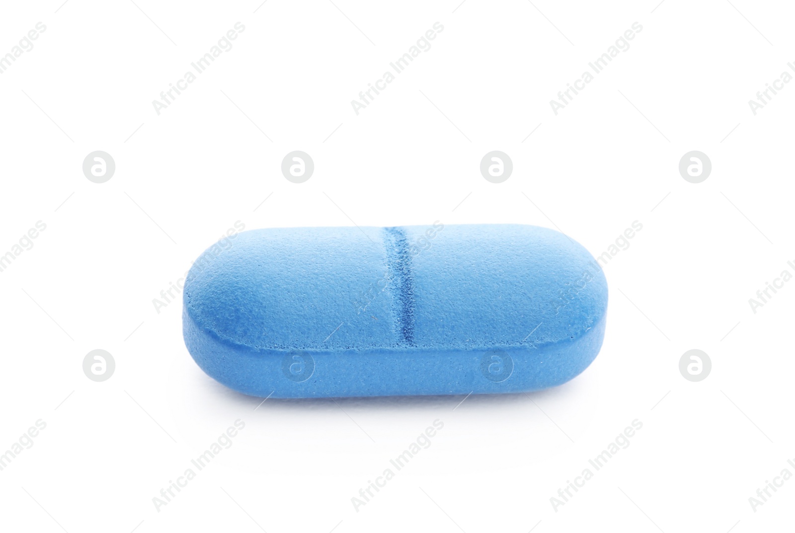 Photo of Color pill on white background. Medical treatment