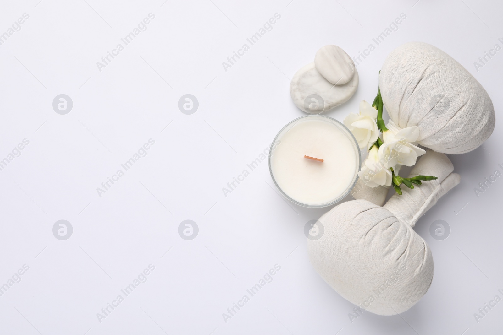 Photo of Flat lay composition with different spa products on white background, space for text