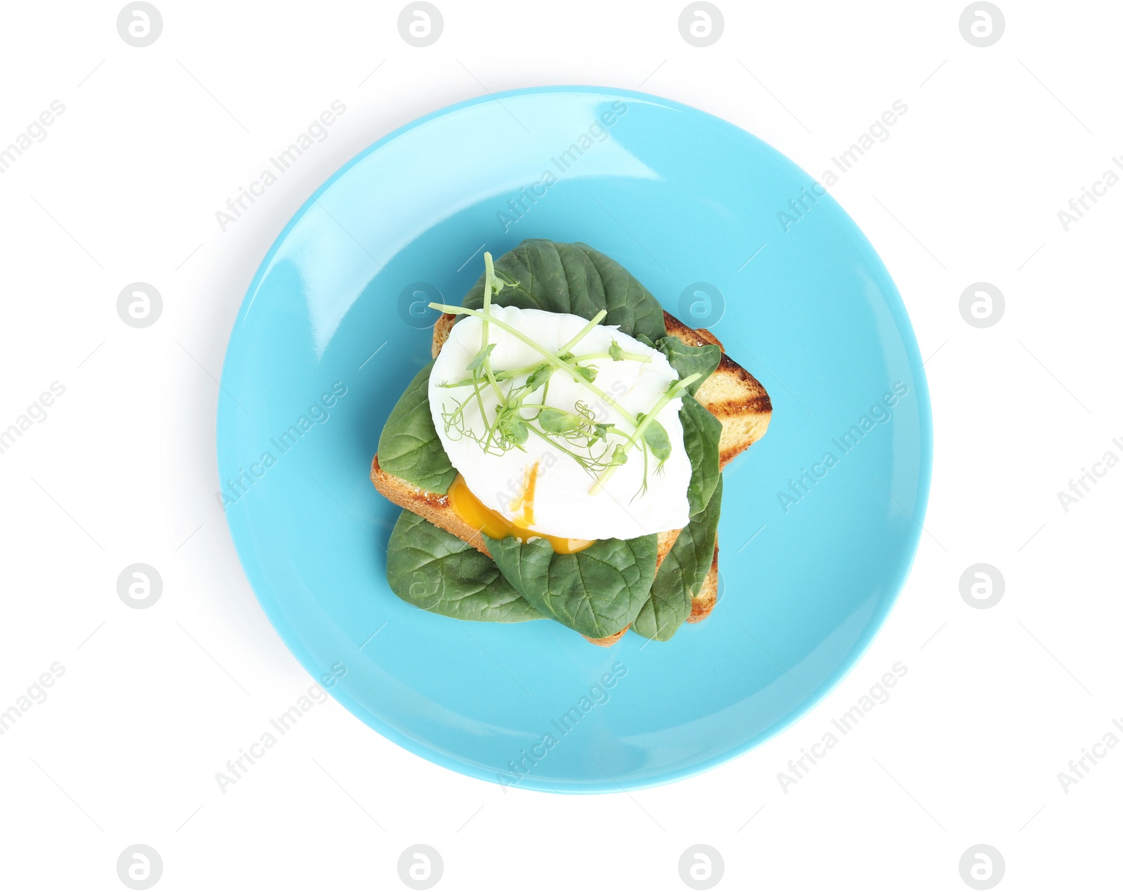 Photo of Delicious poached egg sandwich isolated on white, top view