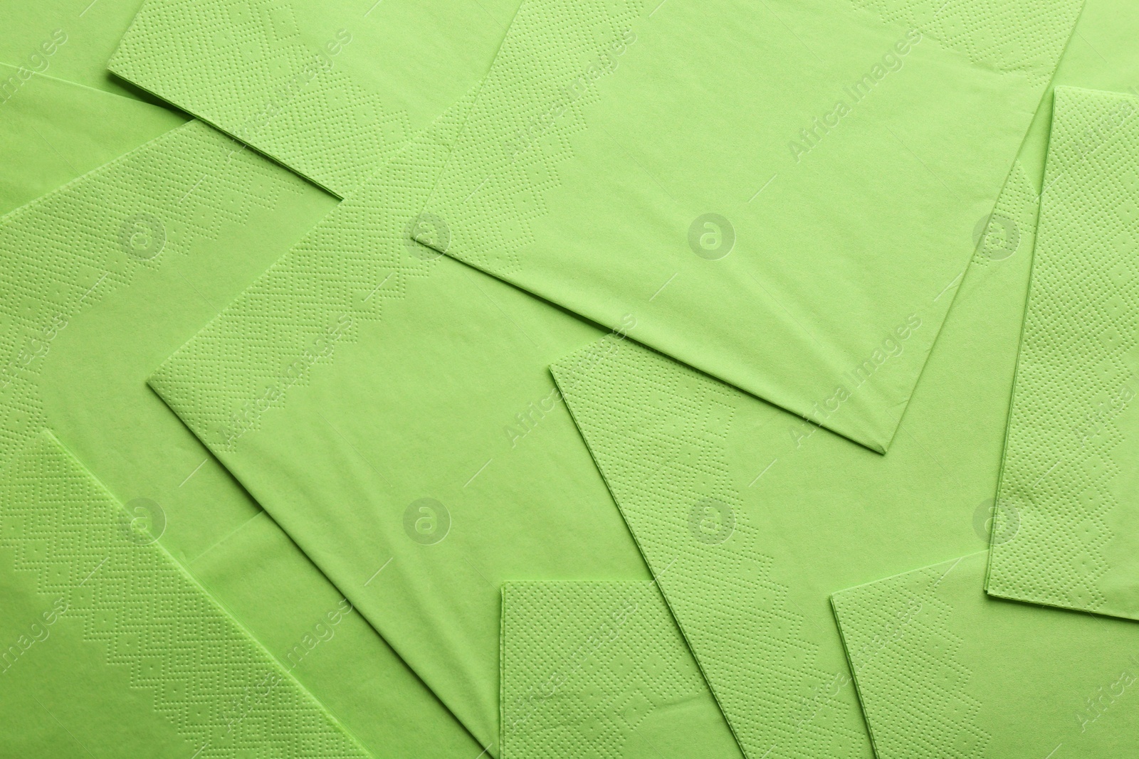 Photo of Clean paper napkins as background, top view. Personal hygiene