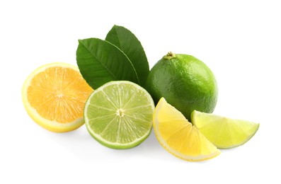 Photo of Fresh ripe lemon, limes and green leaves on white background
