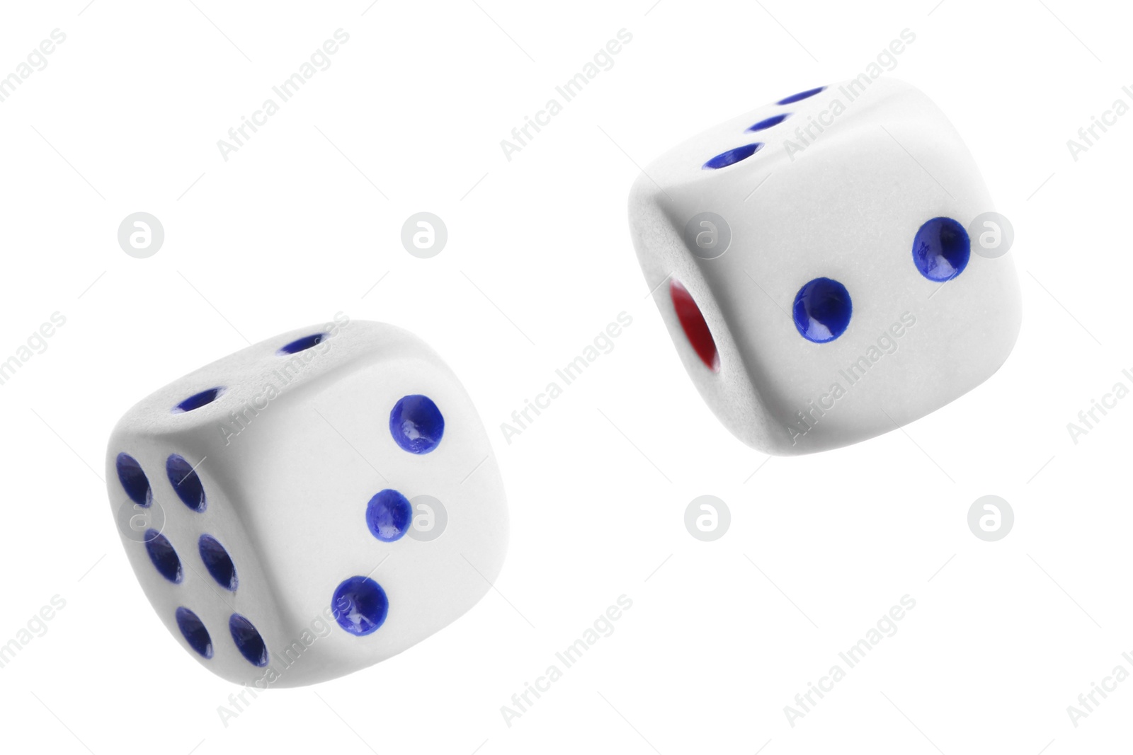 Image of Two dice in air on white background