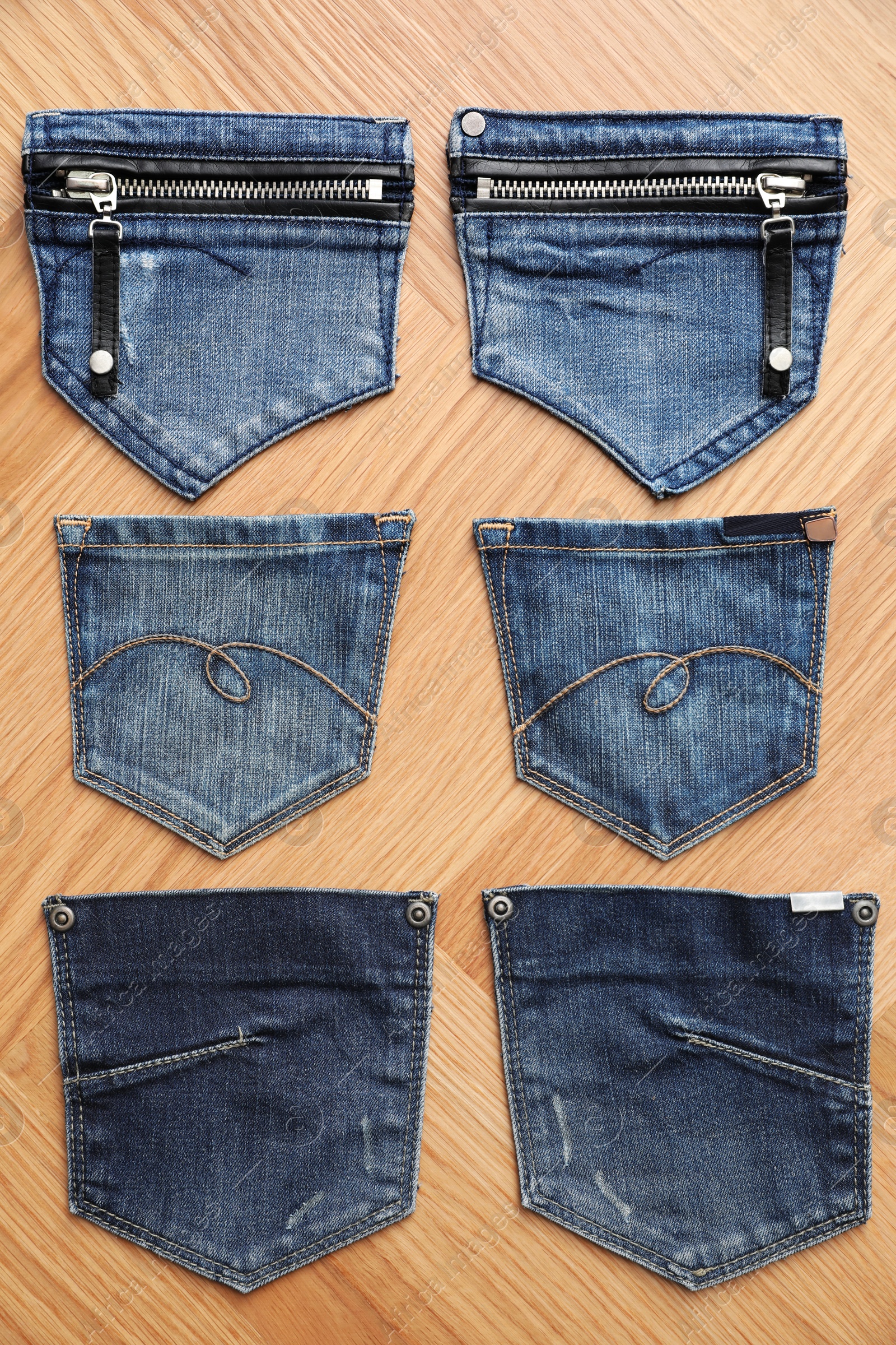 Photo of Flat lay composition with jeans pockets on table