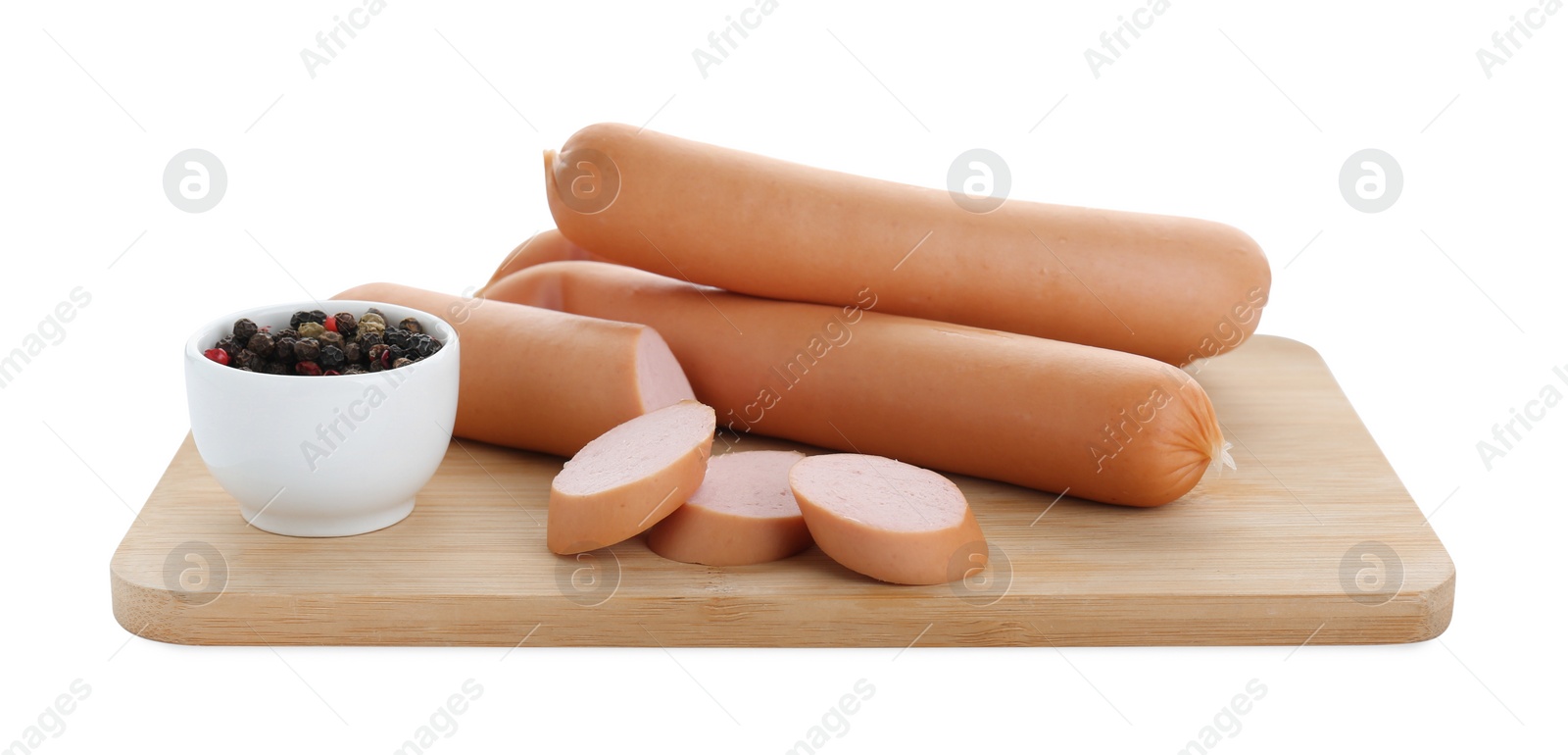 Photo of Wooden board with tasty sausages and peppercorns isolated on white. Meat product