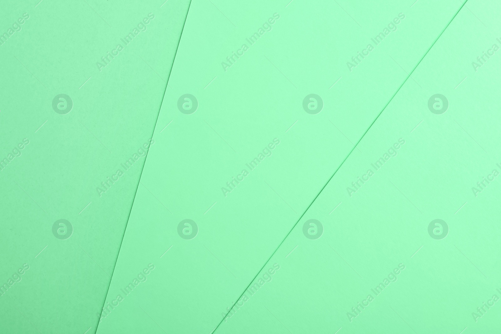 Image of Paper sheets as background. Image toned in mint color 