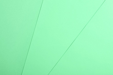 Image of Paper sheets as background. Image toned in mint color 