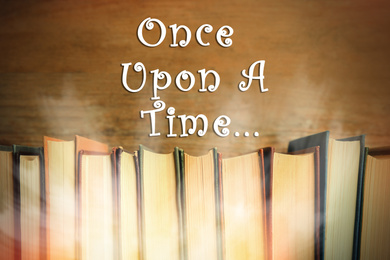 Image of Many books of fairy tales and text Once upon a time