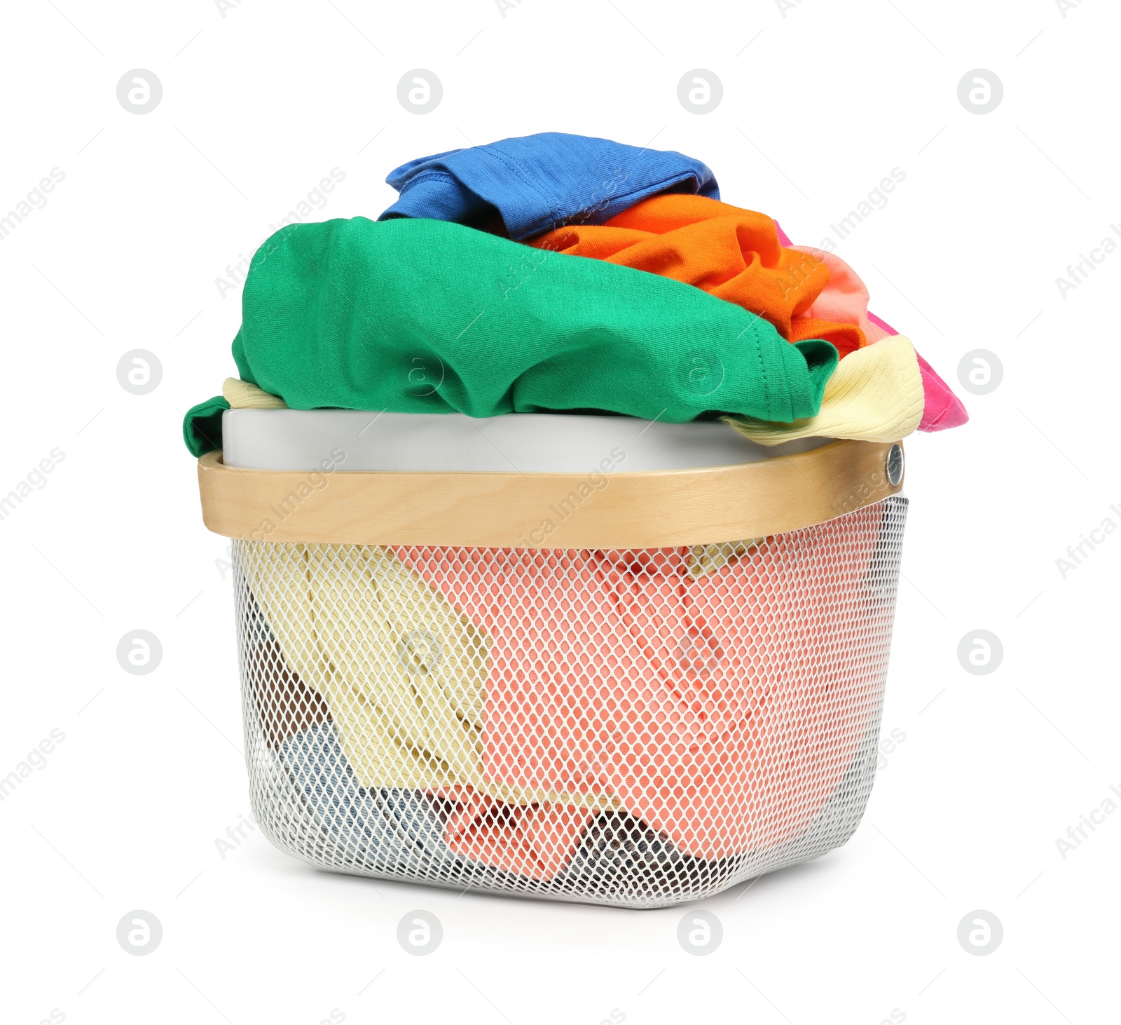 Photo of Laundry basket with clean colorful clothes isolated on white