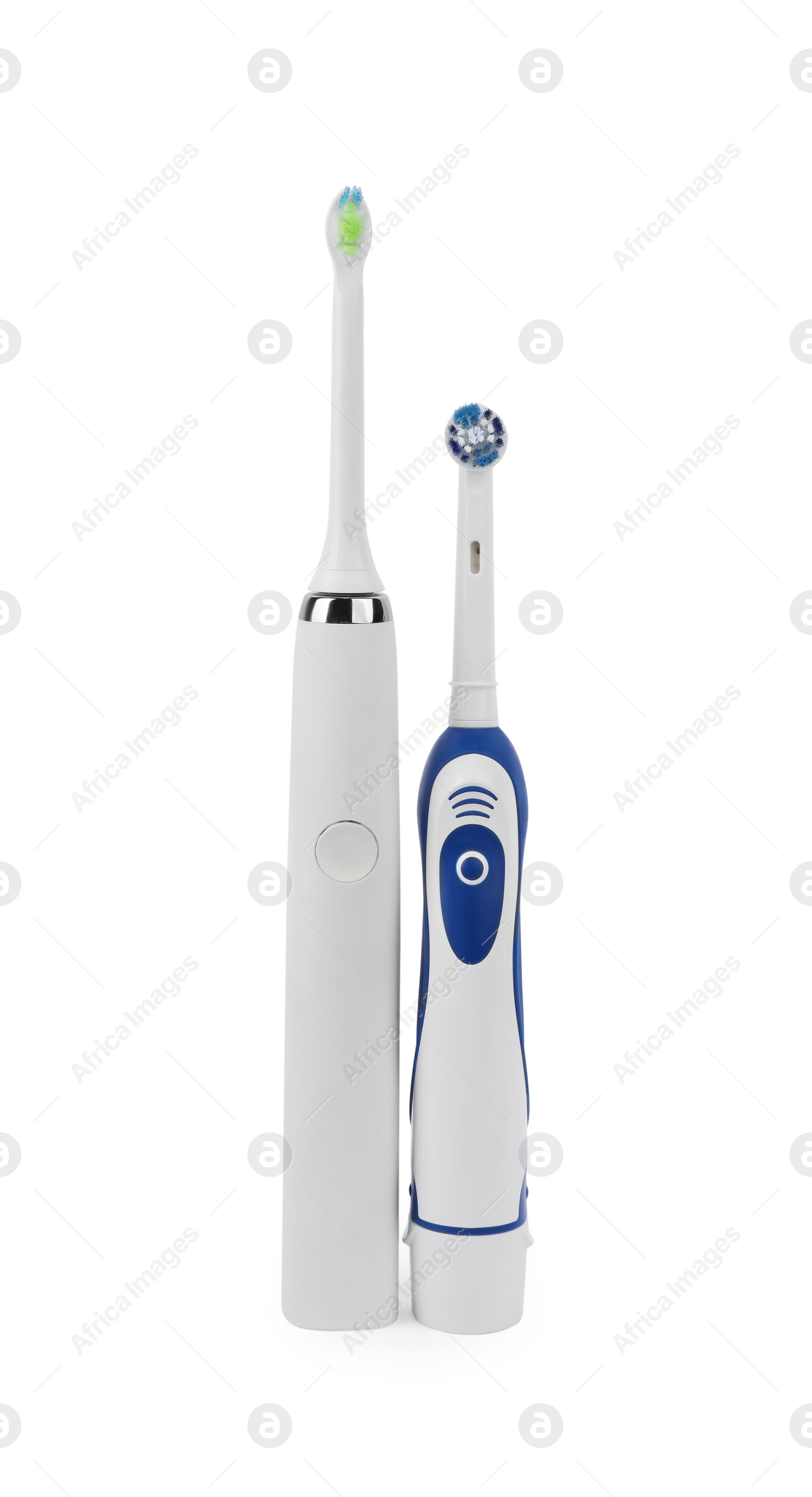 Photo of Electric toothbrushes on white background. Dental care