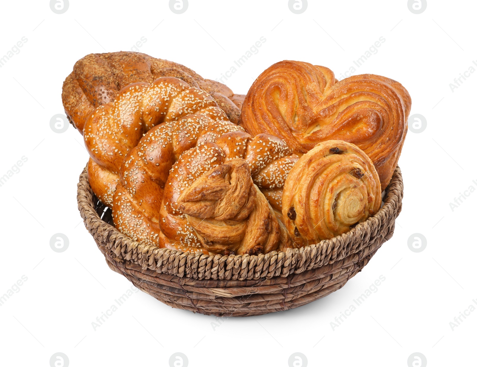 Photo of Different tasty pastries in wicker basket isolated on white