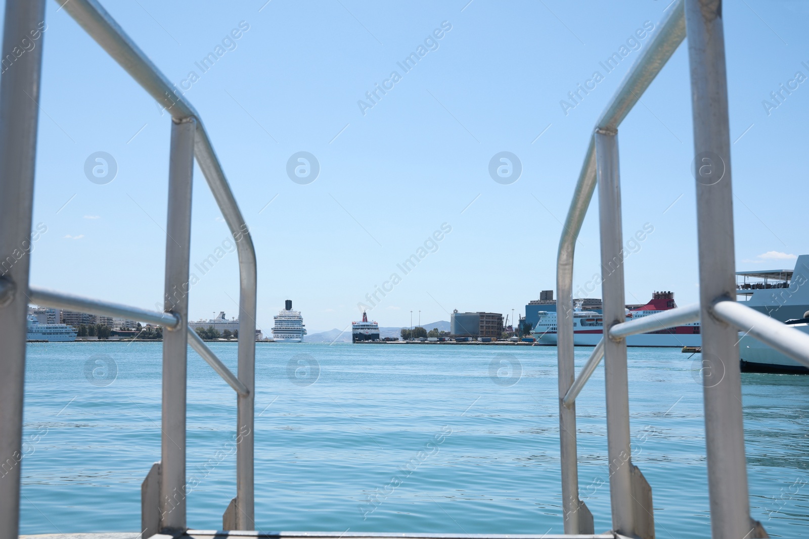 Photo of Modern ship gangway in sea port on sunny day