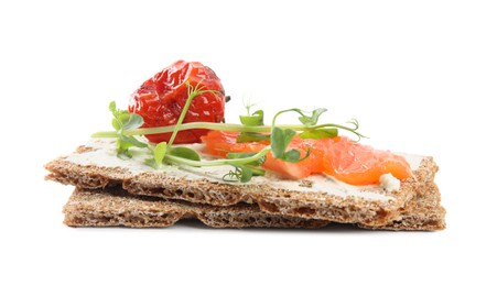 Photo of Fresh rye crispbreads with salmon, cream cheese and grilled tomato on white background