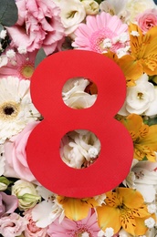 Photo of Number 8 on beautiful flowers, top view. International Women's day