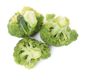Photo of Cut green cauliflowers on white background, top view. Healthy food