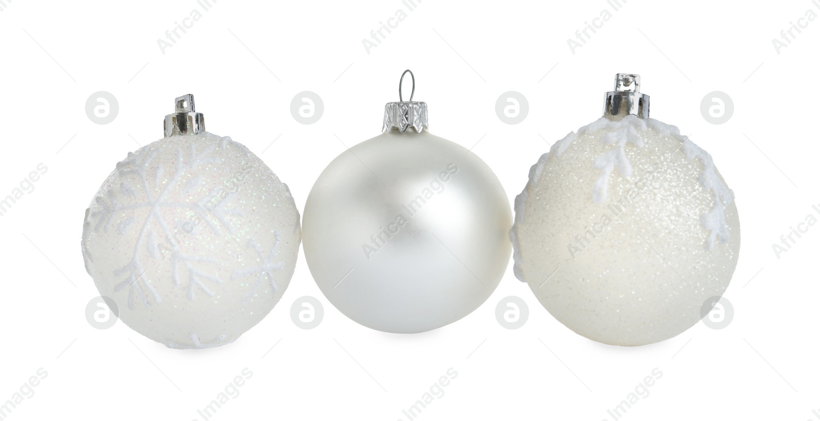 Photo of Beautiful shiny Christmas balls on white background