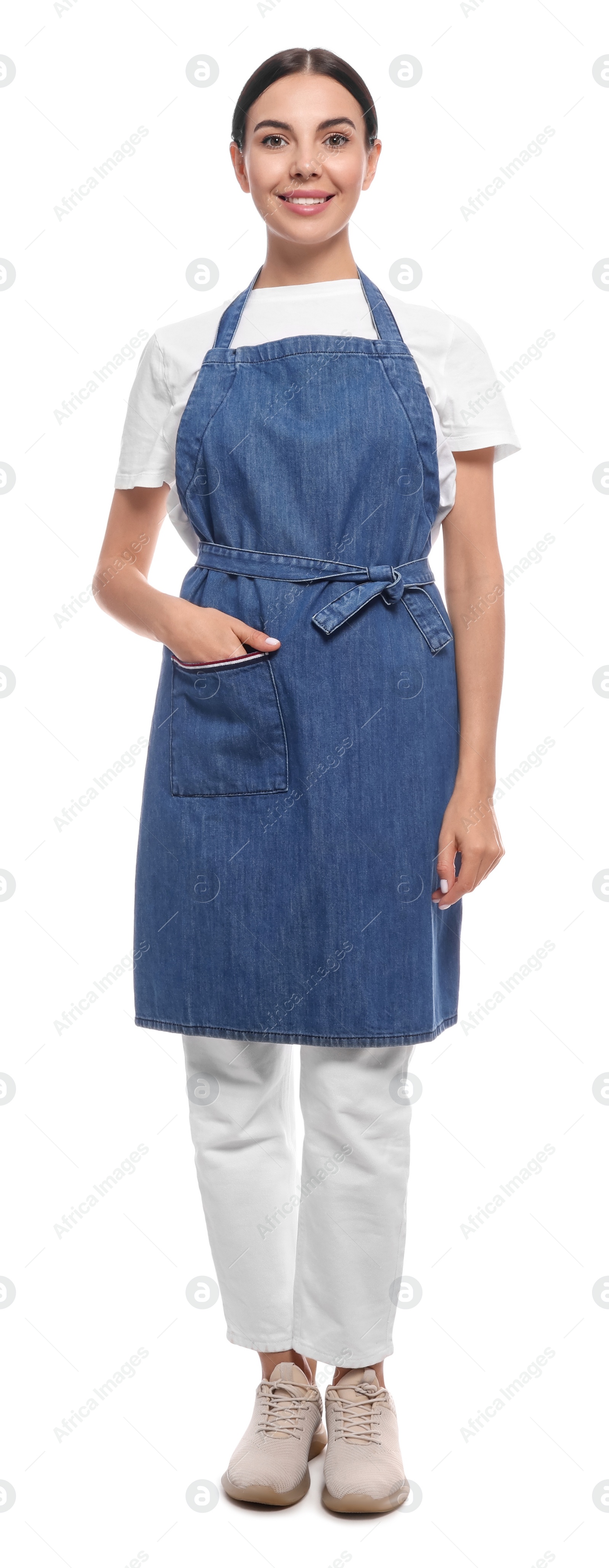 Photo of Young woman in blue jeans apron on white background