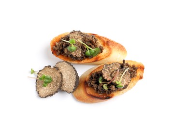 Photo of Tasty bruschettas with truffle paste on white background, top view