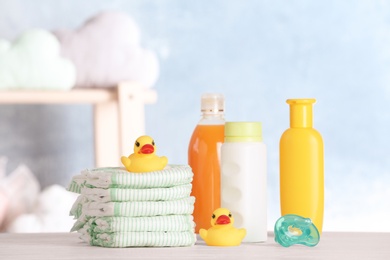 Set with baby accessories on table indoors