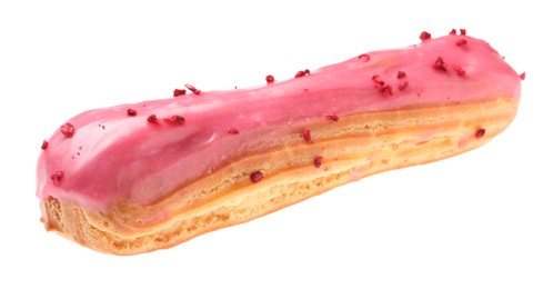 Photo of Delicious eclair covered with pink glaze isolated on white