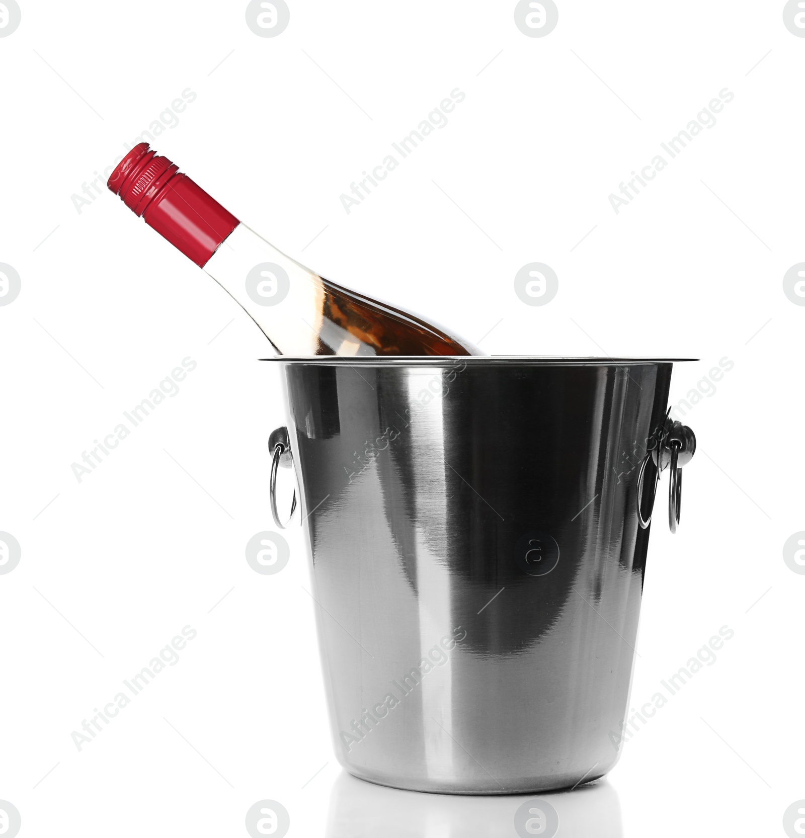 Photo of Bottle of rose champagne in bucket on white background