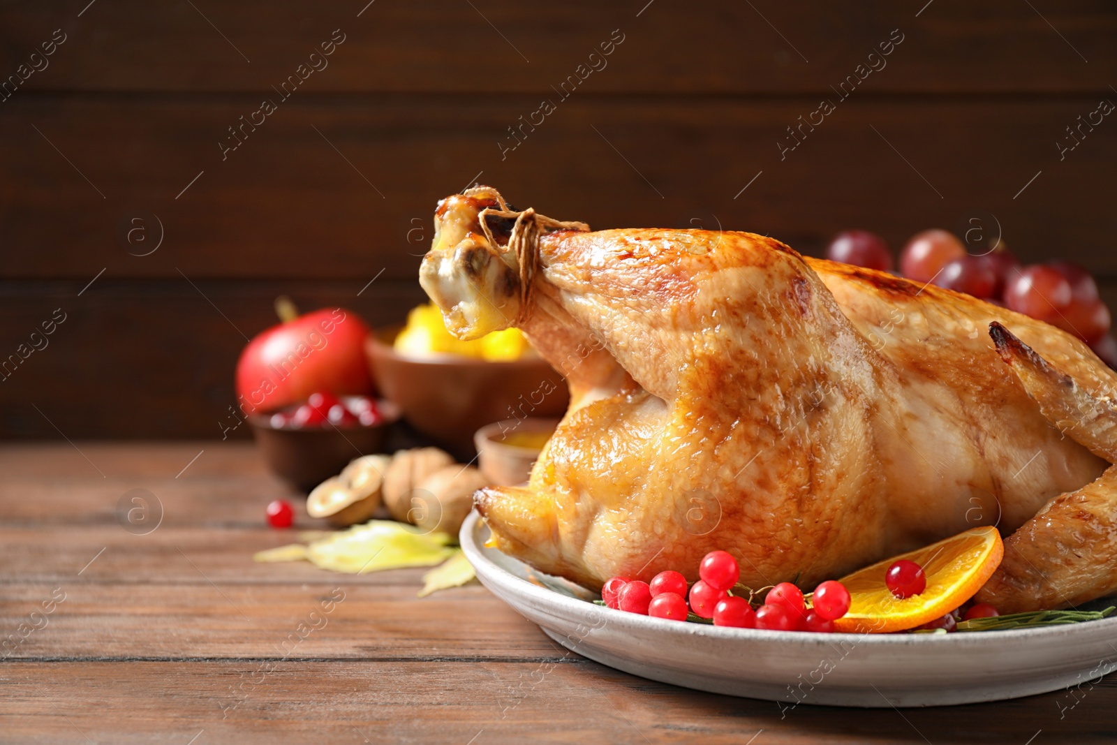 Photo of Composition with turkey on wooden background. Happy Thanksgiving day