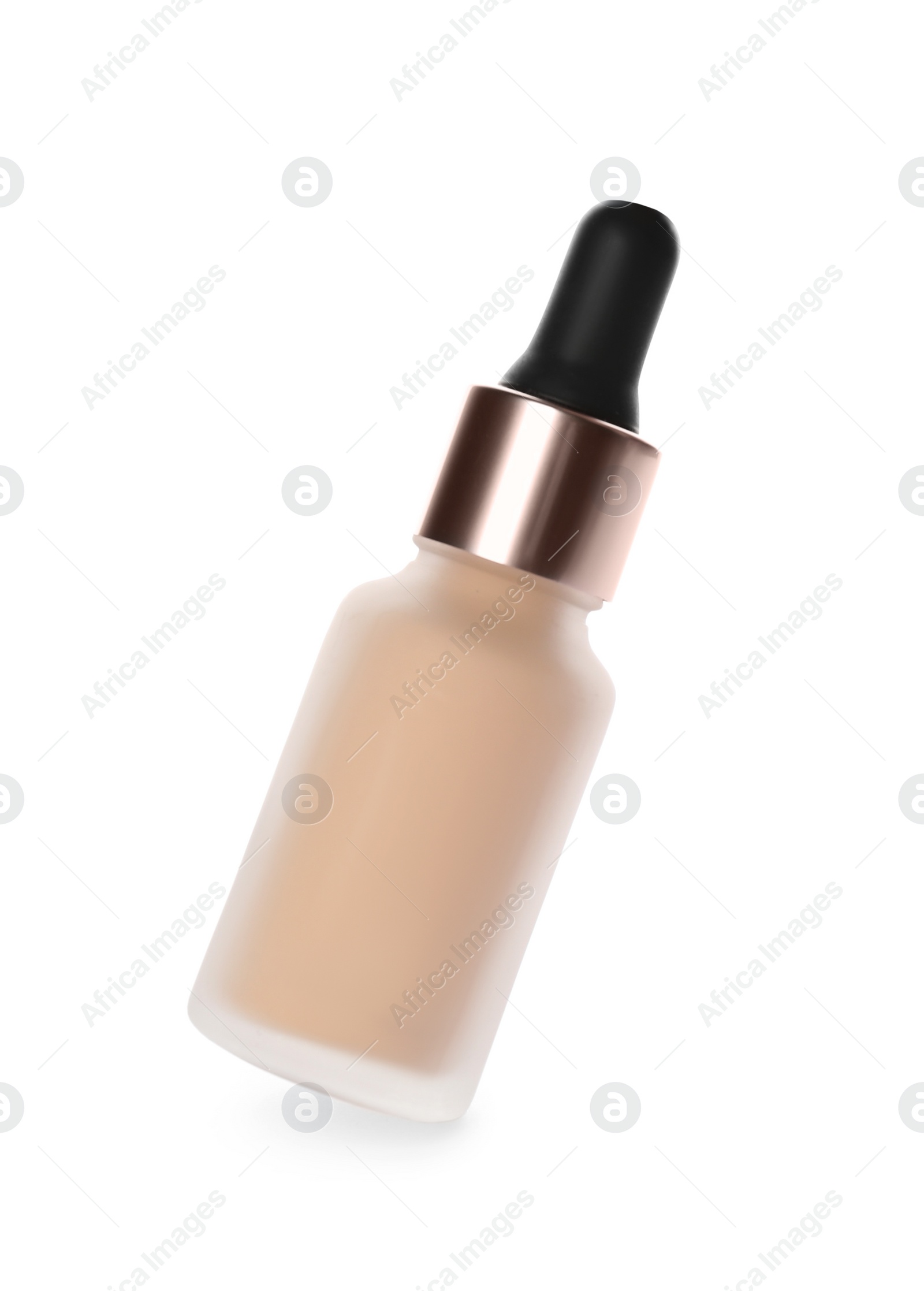 Photo of Bottle of skin foundation isolated on white. Makeup product