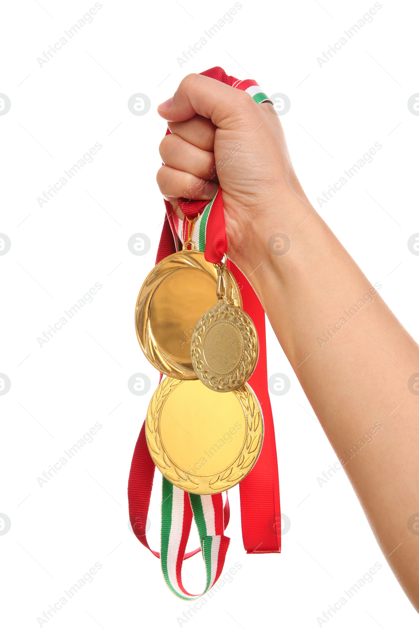 Photo of Woman holding gold medals on white background, closeup